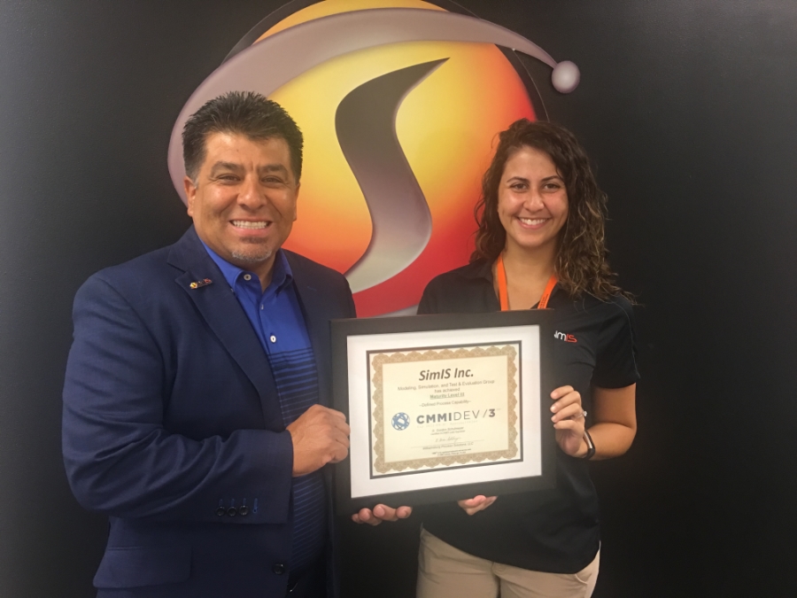 Dr. Johnny Garcia and Shabril Derco with the CMMI certificate